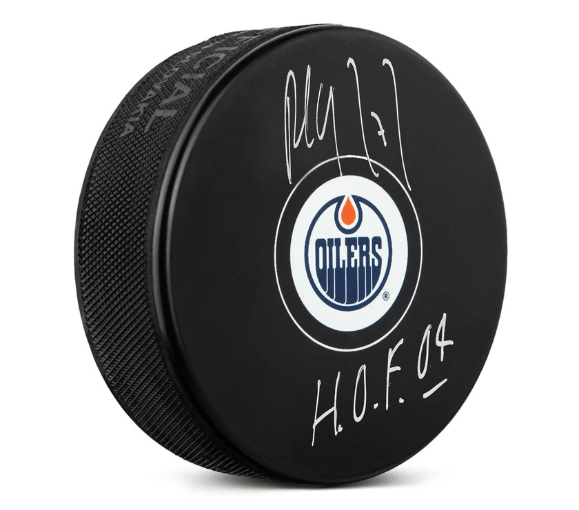 Paul Coffey a signé la rondelle des Oilers d'Edmonton