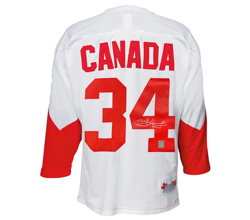 Camiseta de la Summit Series de 1972 firmada por el equipo de Canadá de Marcel Dionne