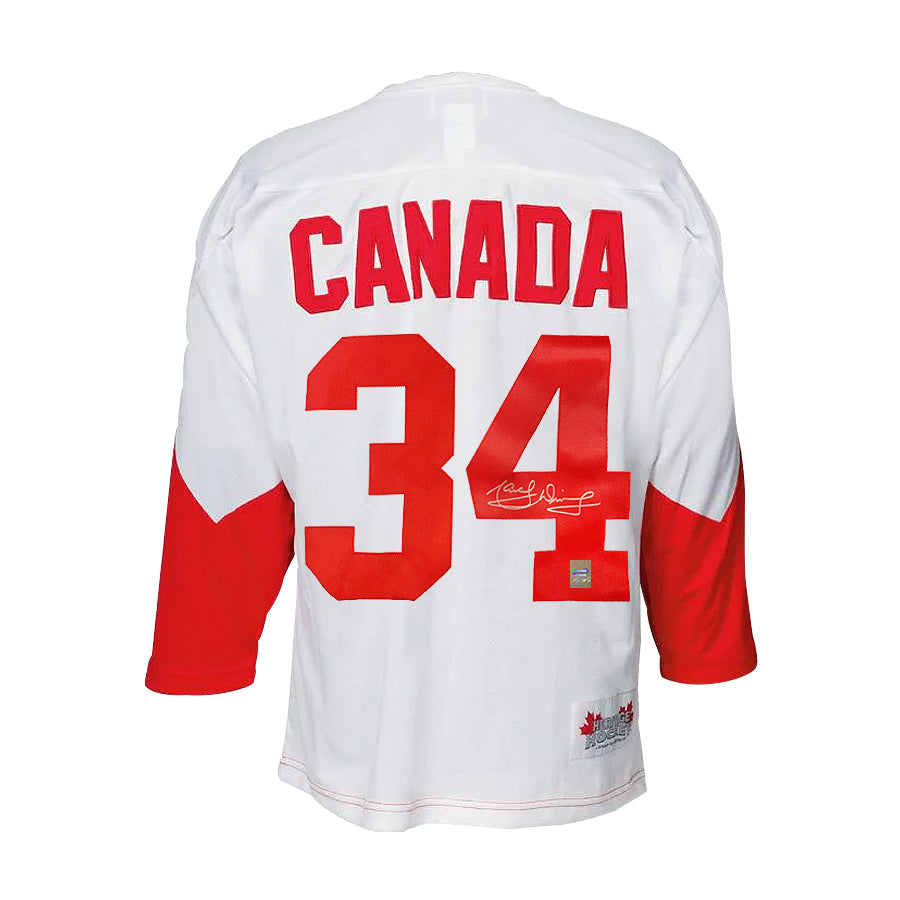 Camiseta de la Summit Series de 1972 firmada por el equipo de Canadá de Marcel Dionne